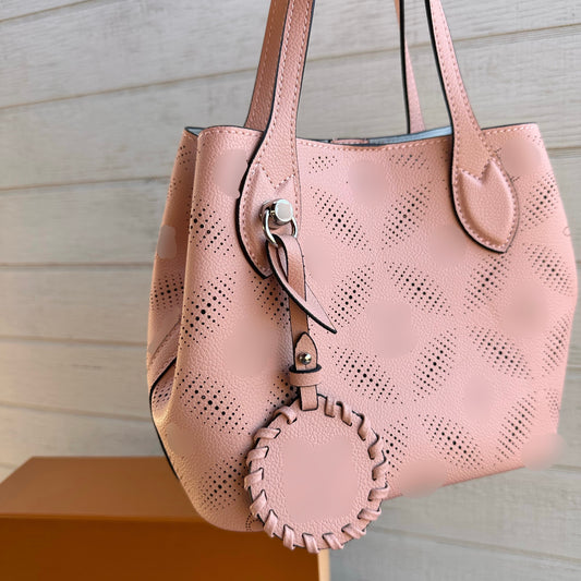 Pink perforated bag